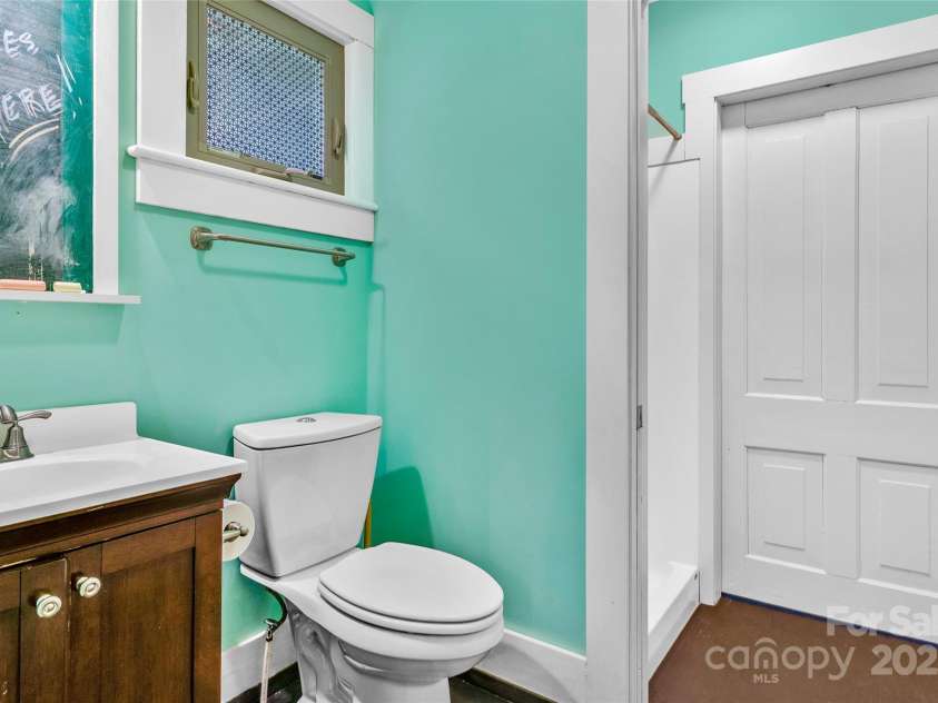 62 Elizabeth Place, Asheville, NC 28801.  MLS# CAR4254605, YatesRealty ID 20685. Bathroom floors are slate from old schoolhouse chalkboards.