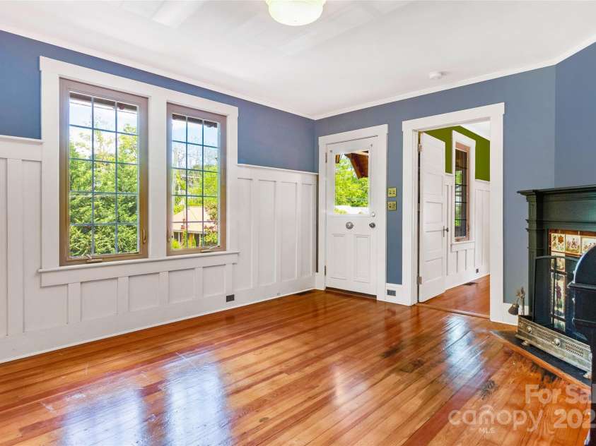 62 Elizabeth Place, Asheville, NC 28801.  MLS# CAR4254605, YatesRealty ID 20685. Newer windows let the light in to highlight gleaming hardwoods in this gem!