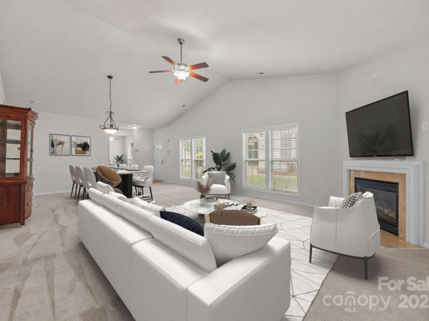 8313 Carob Tree Lane, Charlotte, NC 28215.  MLS# CAR4250541, YatesRealty ID 20686. Digitally Staged Living Room