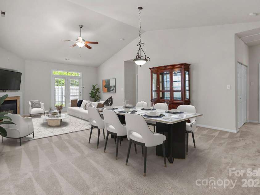 8313 Carob Tree Lane, Charlotte, NC 28215.  MLS# CAR4250541, YatesRealty ID 20686. Digitally Staged Living Room