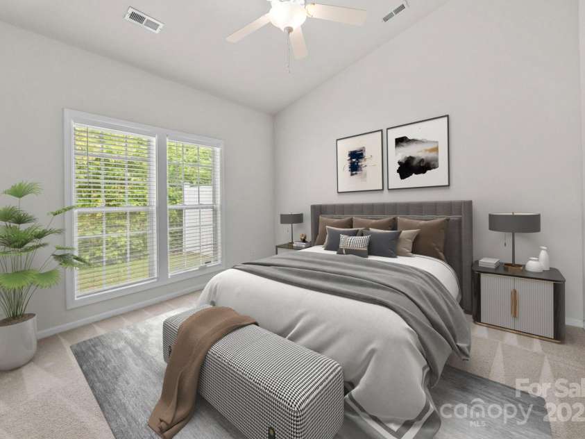 8313 Carob Tree Lane, Charlotte, NC 28215.  MLS# CAR4250541, YatesRealty ID 20686. Digitally Staged Primary bedroom