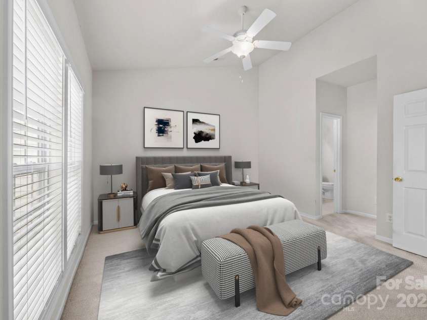 8313 Carob Tree Lane, Charlotte, NC 28215.  MLS# CAR4250541, YatesRealty ID 20686. Digitally Staged Primary bedroom