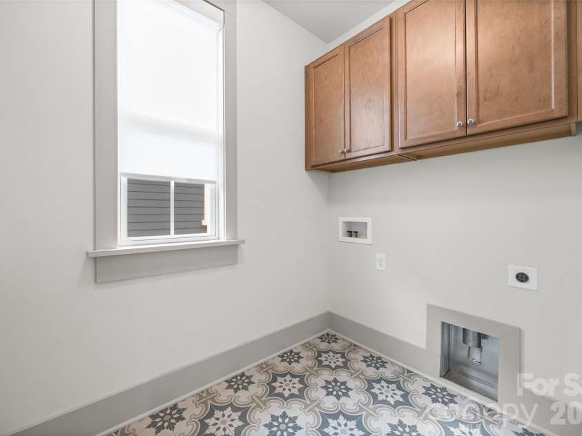 539 Plowman Lane, Fort Mill, SC 29715.  MLS# CAR4342093, YatesRealty ID 20689. Laundry with extra storage