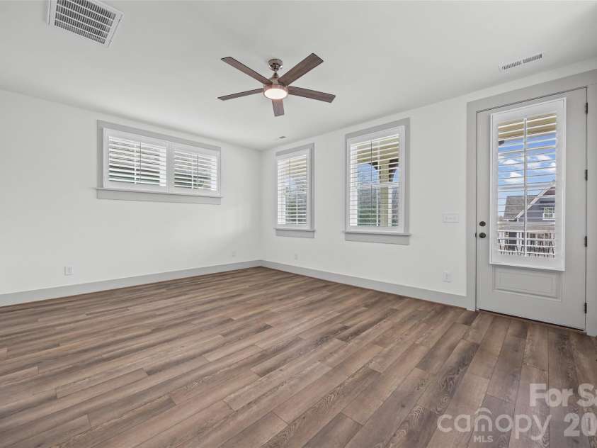 539 Plowman Lane, Fort Mill, SC 29715.  MLS# CAR4342093, YatesRealty ID 20689. Primary Bedroom With Access to Balcony