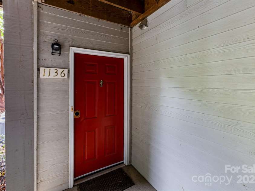 1136 1st Street, Charlotte, NC 28202.  MLS# CAR4263949, YatesRealty ID 20692. Back door to unit