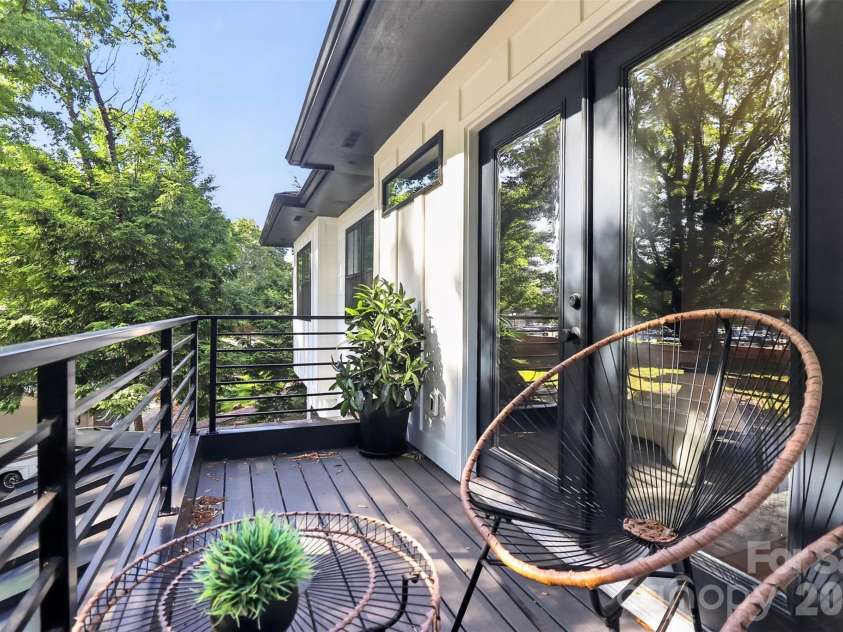 5026 Buckingham Drive, Charlotte, NC 28209.  MLS# CAR4376600, YatesRealty ID 20692. Balcony off primary suite