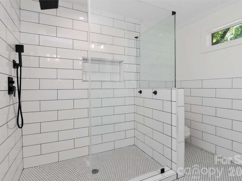 5026 Buckingham Drive, Charlotte, NC 28209.  MLS# CAR4376600, YatesRealty ID 20692. Primary bathroom