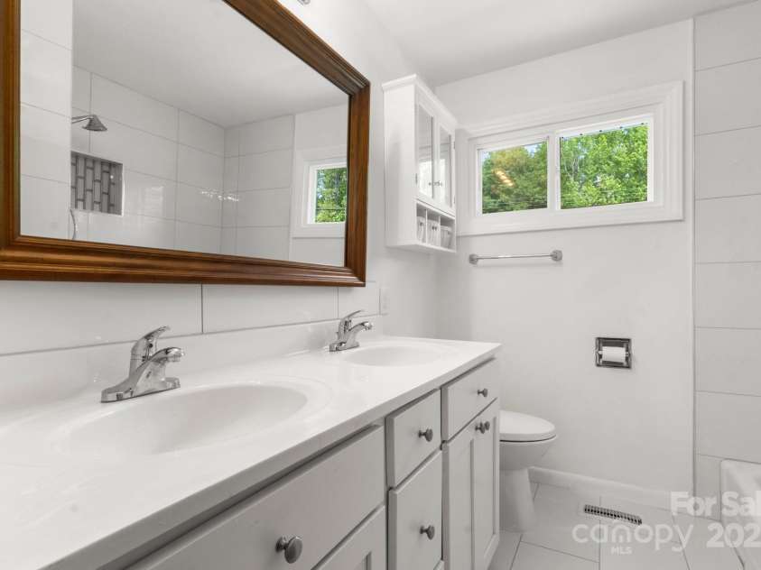1725 Fallston Road, Shelby, NC 28150.  MLS# CAR4254792, YatesRealty ID 20698. The newly remodeled bath features a double vanity,...