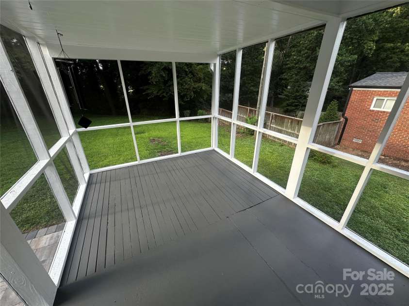 2115 Arnold Drive, Charlotte, NC 28205.  MLS# CAR4269939, YatesRealty ID 20701. Back Screened in Patio