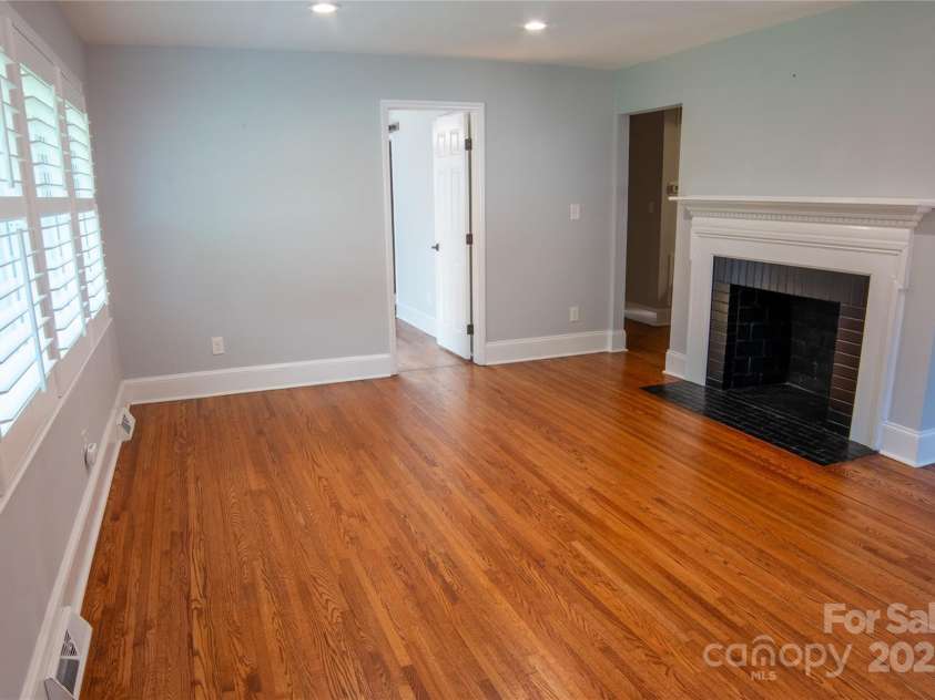 2115 Arnold Drive, Charlotte, NC 28205.  MLS# CAR4269939, YatesRealty ID 20701. Living Room Area