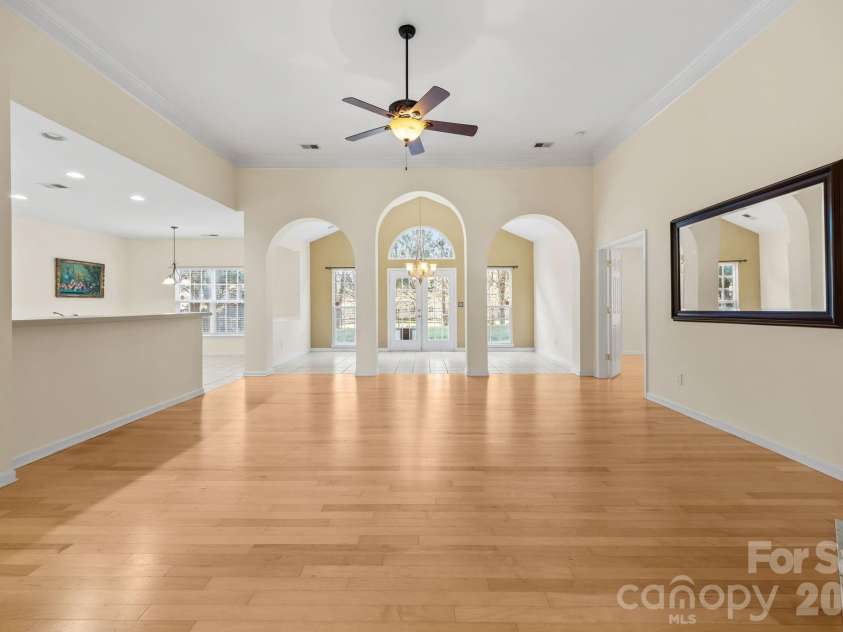 12602 Kemerton Lane, Huntersville, NC 28078.  MLS# CAR4356592, YatesRealty ID 20706. Livingroom looking to the Sunroom