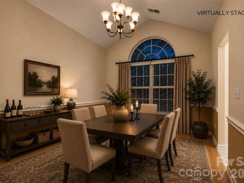 12602 Kemerton Lane, Huntersville, NC 28078.  MLS# CAR4416314, YatesRealty ID 20706. DINING ROOM.  SUCH AN INTIMATE EXPERIENCE WITH DRAMATIC WINDOW AND VAULTED CEILING.