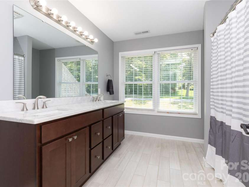460 Panther Branch Road, Alexander, NC 28701.  MLS# CAR4293485, YatesRealty ID 20708. Hall Bathroom