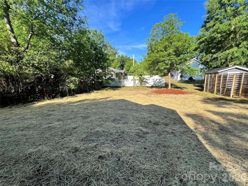 310 Coble Avenue, Albemarle, NC 28001.  MLS# CAR4379673, YatesRealty ID 20709. Backyard