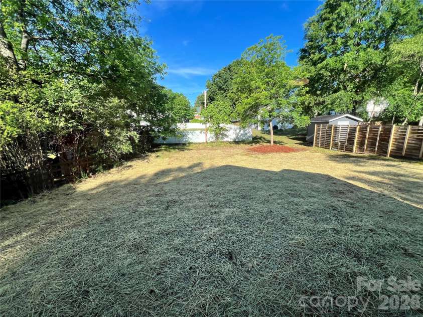 310 Coble Avenue, Albemarle, NC 28001.  MLS# CAR4379673, YatesRealty ID 20709. Backyard