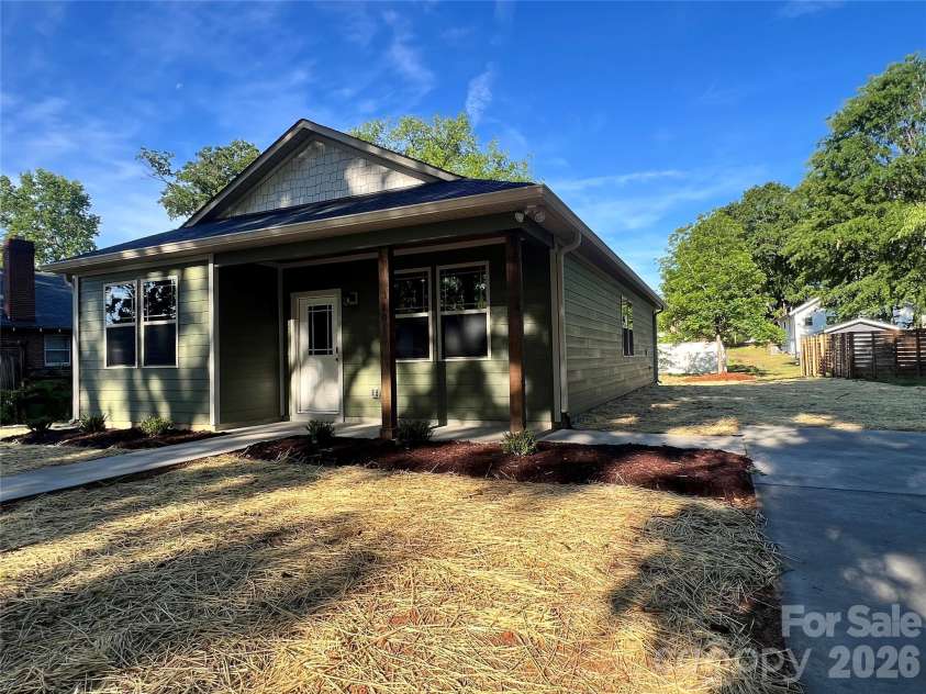 310 Coble Avenue, Albemarle, NC 28001.  MLS# CAR4379673, YatesRealty ID 20709. Right View with Driveway