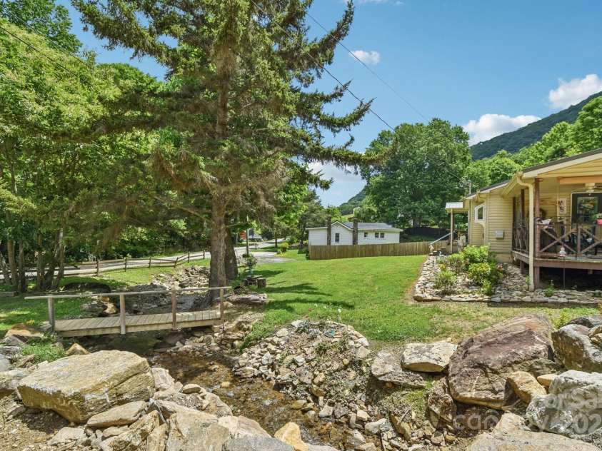 19 Lockman Road, Maggie Valley, NC 28751.  MLS# CAR4270927, YatesRealty ID 20711. Creekside