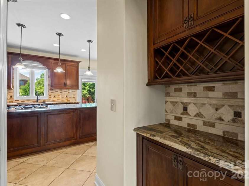 11917 Chevis Court, Charlotte, NC 28277.  MLS# CAR4250951, YatesRealty ID 20716. Butler's Pantry across from Custom Pantry