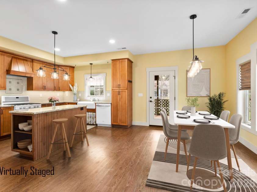 45 Verde Drive, Asheville, NC 28806.  MLS# CAR4361854, YatesRealty ID 20717. Kitchen and dining open to a back screened porch