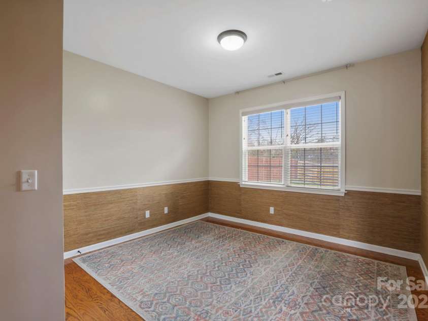 243 Wildbriar Road, Fletcher, NC 28732.  MLS# CAR4240300, YatesRealty ID 20721. Downstairs bedroom with mountain views