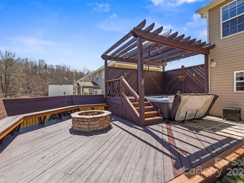 243 Wildbriar Road, Fletcher, NC 28732.  MLS# CAR4240300, YatesRealty ID 20721. Firepit for evening gatherings