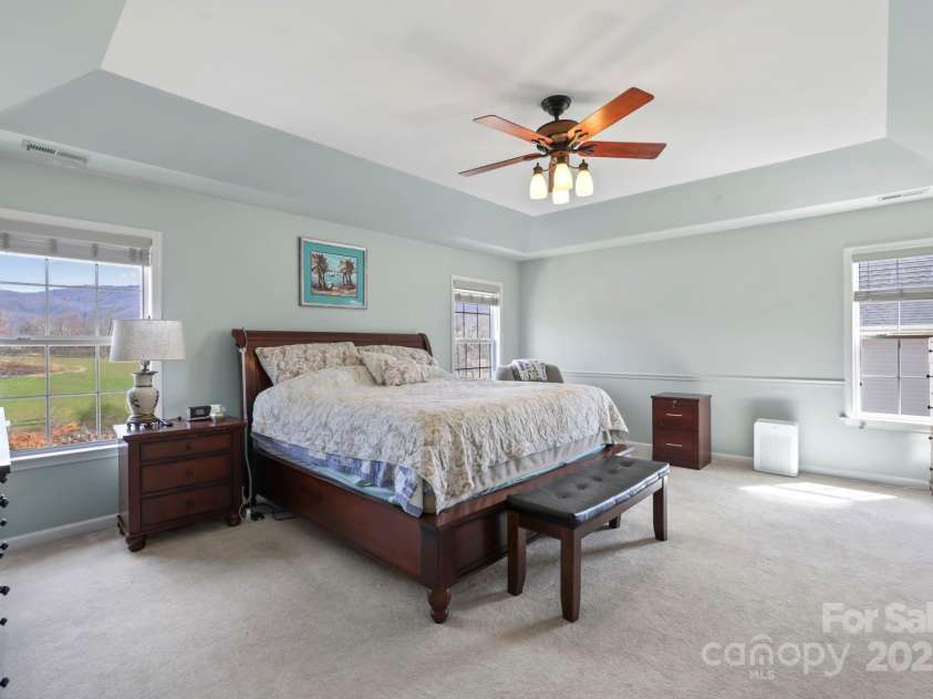 243 Wildbriar Road, Fletcher, NC 28732.  MLS# CAR4240300, YatesRealty ID 20721. Your peaceful primary suite retreat complete with fabulous mountain views!