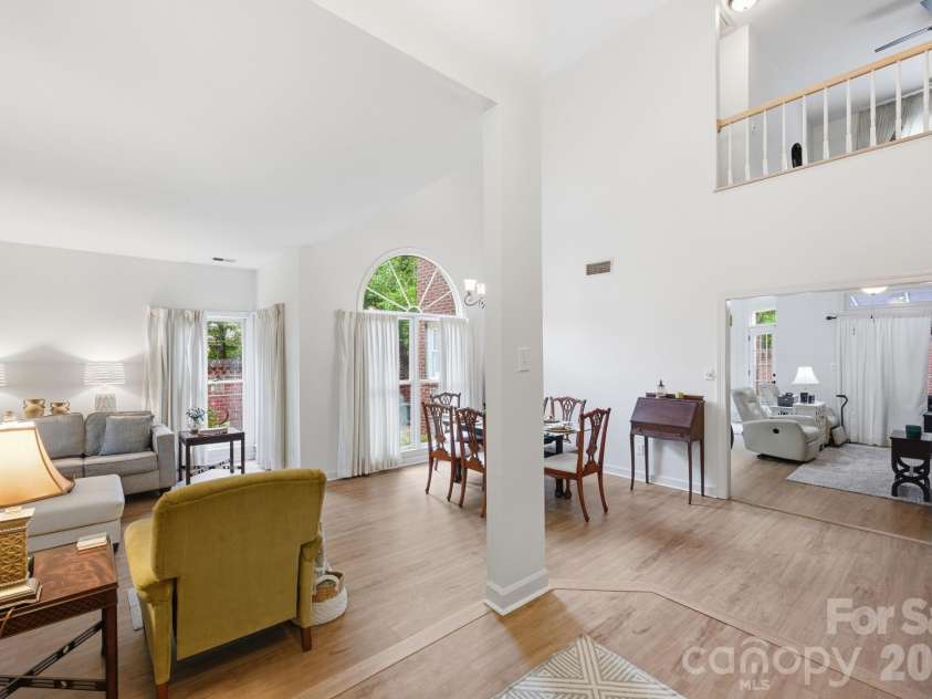 7014 Walton Heath Lane, Charlotte, NC 28277.  MLS# CAR4376806, YatesRealty ID 20725. As you enter this home, you'll be impressed by the open floor plan, soaring ceiling, and brand NEW LVP flooring that runs throughout most of the MAIN!