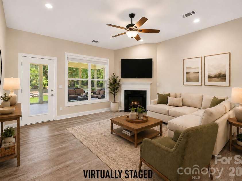 9026 Raven Top Drive, Mint Hill, NC 28227.  MLS# CAR4387589, YatesRealty ID 20731. Living Room Virtually Staged