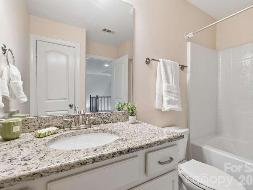 9026 Raven Top Drive, Mint Hill, NC 28227.  MLS# CAR4387589, YatesRealty ID 20731. Upstairs Bathroom