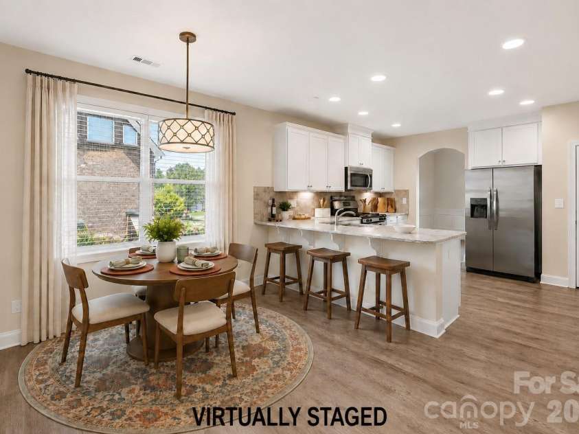 9026 Raven Top Drive, Mint Hill, NC 28227.  MLS# CAR4387589, YatesRealty ID 20731. Virtually Staged Breakfast Nook