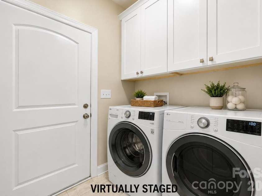 9026 Raven Top Drive, Mint Hill, NC 28227.  MLS# CAR4387589, YatesRealty ID 20731. Virtually Staged Laundry on Main Floor