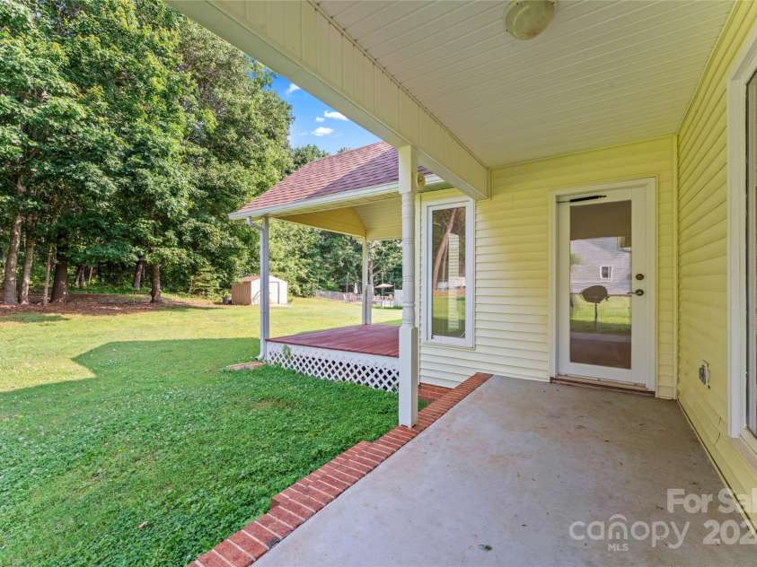 4499 Briarcreek Road, Maiden, NC 28650.  MLS# CAR4263813, YatesRealty ID 20737. Rear covered porch/deck