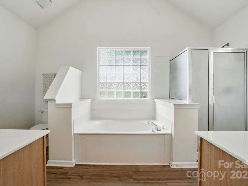 146 Burtons Barn Road, Mooresville, NC 28115.  MLS# CAR4257807, YatesRealty ID 20739. Spa-Like Bath w/Garden Tub and Separate Shower