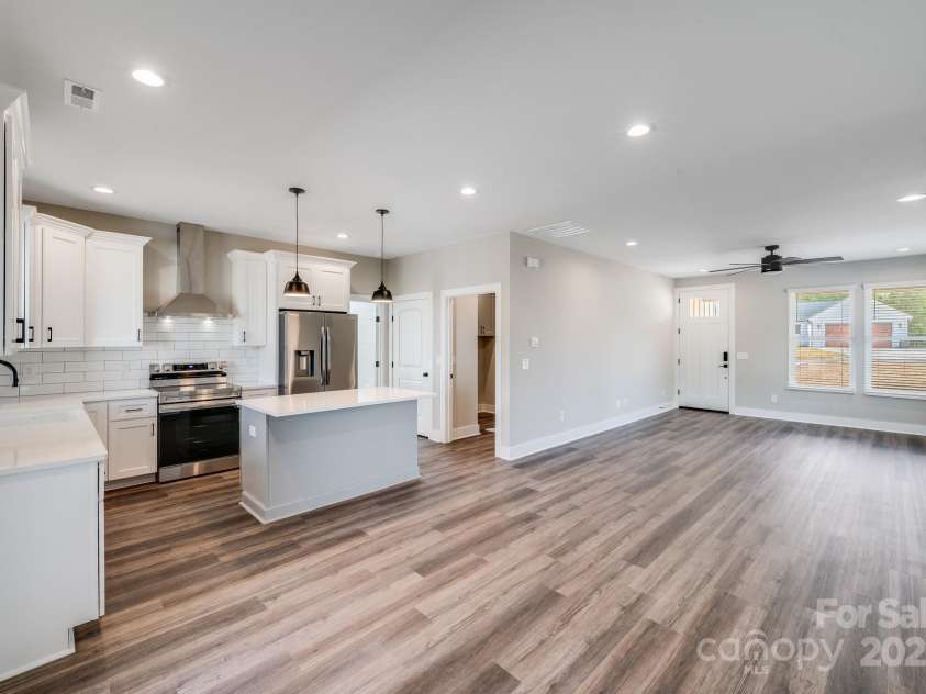 28655-A NC Hwy 73 Highway, Albemarle, NC 28001.  MLS# CAR4246876, YatesRealty ID 20741. Open Living Kitchen and Dining NOTE: ALL PICS ARE OF PREVIOUS BUILDS This home will have a Vinyl Exterior