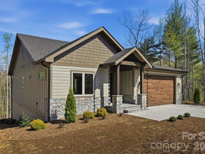 173 Waters Edge Drive, Nebo, NC 28761.  MLS# CAR4364596, YatesRealty ID 20742. Welcome to 173 Waters Edge Dr in Nebo, NC. Located in The Arbor at Lake James. This new construction home sits on a .93 acre very private lot and includes a deeded boat slip.