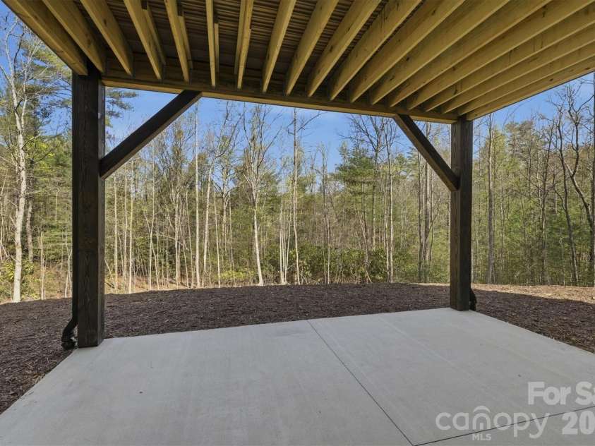 173 Waters Edge Drive, Nebo, NC 28761.  MLS# CAR4364596, YatesRealty ID 20742. With nearly an acre of land, the backyard is super private. 