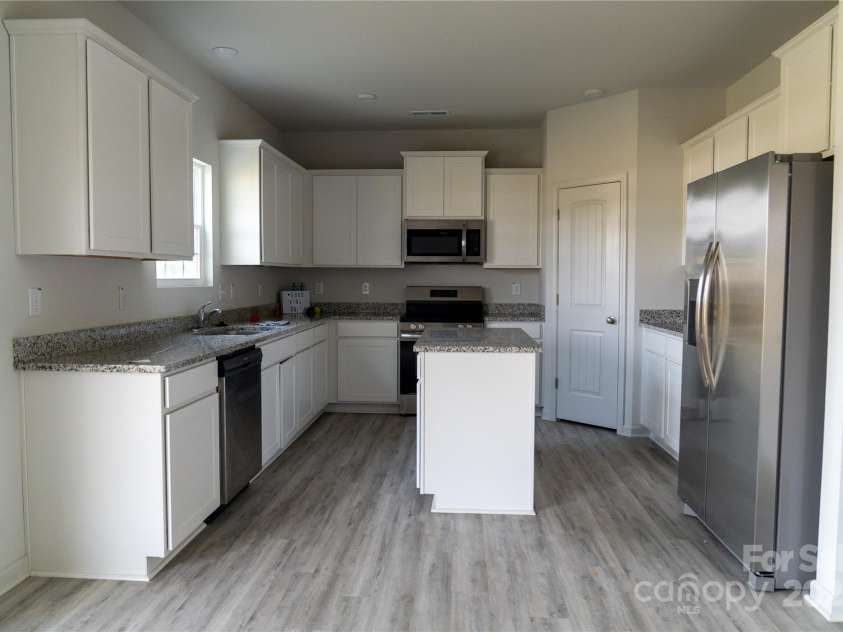 69 Ravibha Court, Clayton, NC 27520.  MLS# CAR4269116, YatesRealty ID 20746. 