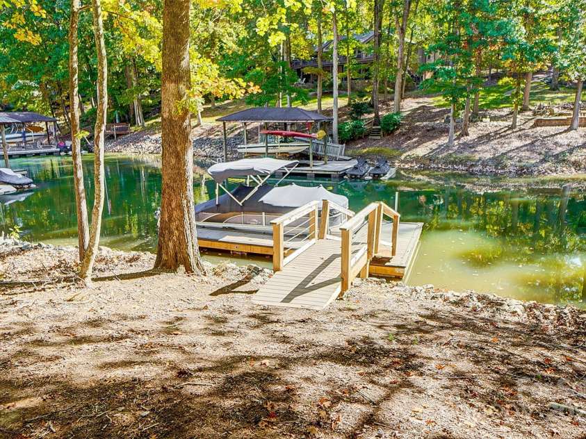 4116 Spring Cove Way, Belmont, NC 28012.  MLS# CAR4326740, YatesRealty ID 20747. Floating dock is just a few steps away for those fun boating adventures