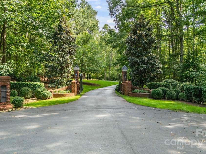 440 Beech Tree Road, Mooresville, NC 28117.  MLS# CAR4293759, YatesRealty ID 2075. Gated Driveway Entrance 
