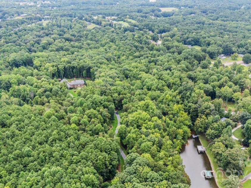 440 Beech Tree Road, Mooresville, NC 28117.  MLS# CAR4293759, YatesRealty ID 2075. Overhead View showing private 35 Acres 