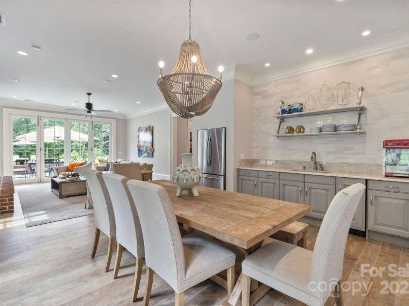 440 Beech Tree Road, Mooresville, NC 28117.  MLS# CAR4293759, YatesRealty ID 2075. Pool House Wet bar & Eating Area 