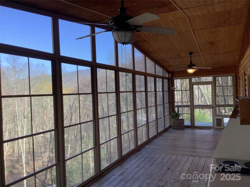 124 Baconton Cove, Waynesville, NC 28786.  MLS# CAR4241453, YatesRealty ID 20752. Covered paneled deck with view