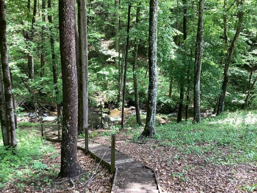 124 Baconton Cove, Waynesville, NC 28786.  MLS# CAR4241453, YatesRealty ID 20752. Creek access