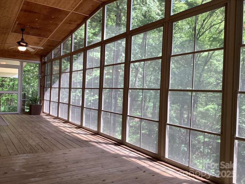 124 Baconton Cove, Waynesville, NC 28786.  MLS# CAR4241453, YatesRealty ID 20752. Enclosed porch with view