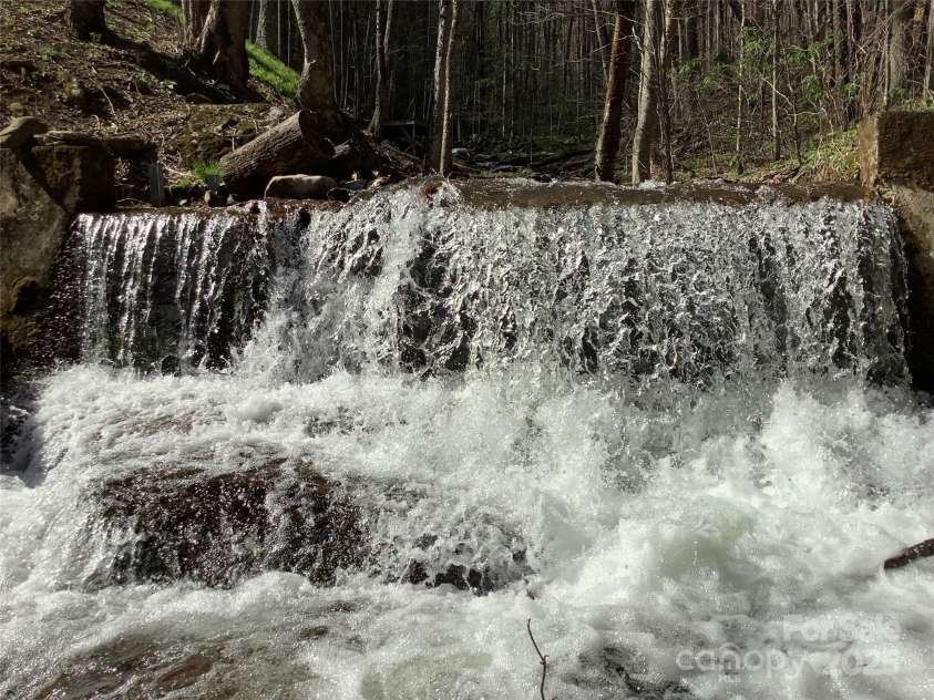 124 Baconton Cove, Waynesville, NC 28786.  MLS# CAR4241453, YatesRealty ID 20752. Listen to the bold creek