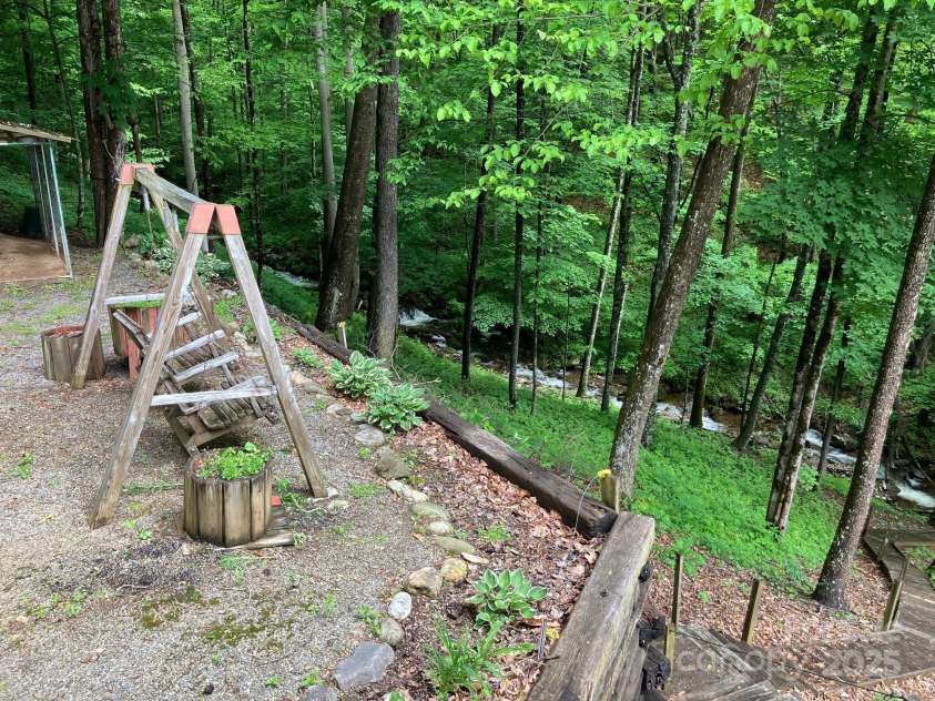 124 Baconton Cove, Waynesville, NC 28786.  MLS# CAR4241453, YatesRealty ID 20752. Listen to the rushing creek
