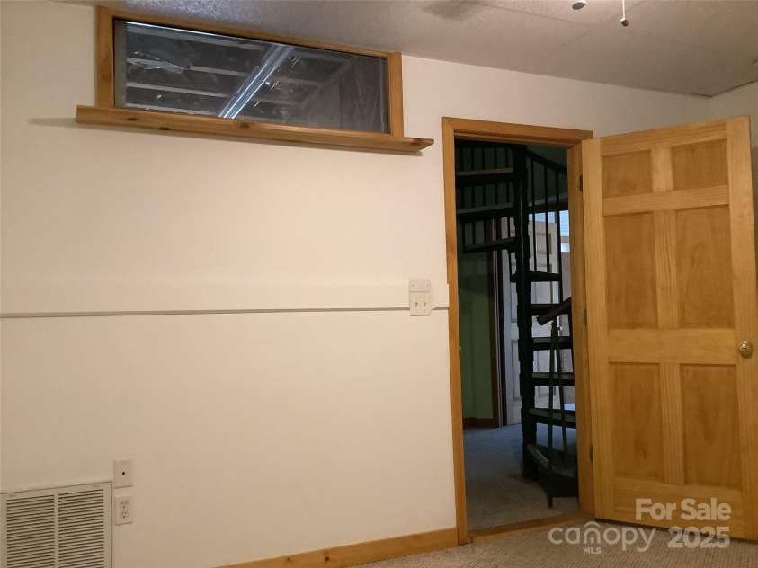 124 Baconton Cove, Waynesville, NC 28786.  MLS# CAR4241453, YatesRealty ID 20752. Lower level bedroom 2