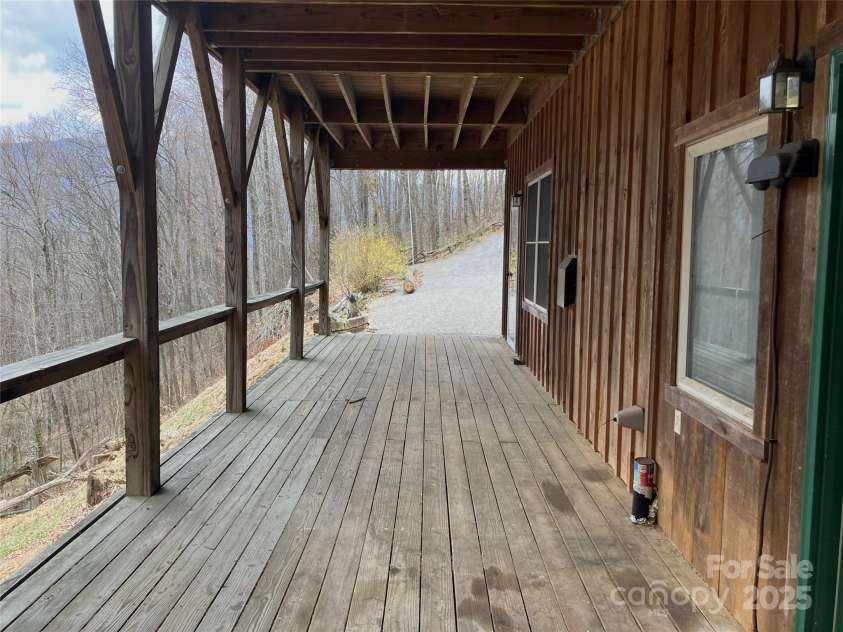 124 Baconton Cove, Waynesville, NC 28786.  MLS# CAR4241453, YatesRealty ID 20752. Lower level deck