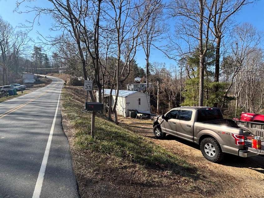 905 Hutch Mountain Road, Fletcher, NC 28732.  MLS# CAR4334539, YatesRealty ID 2076. 