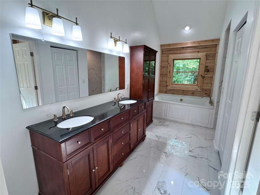 231 Blue Bird Road, Lake Lure, NC 28746.  MLS# CAR4268421, YatesRealty ID 20763. 